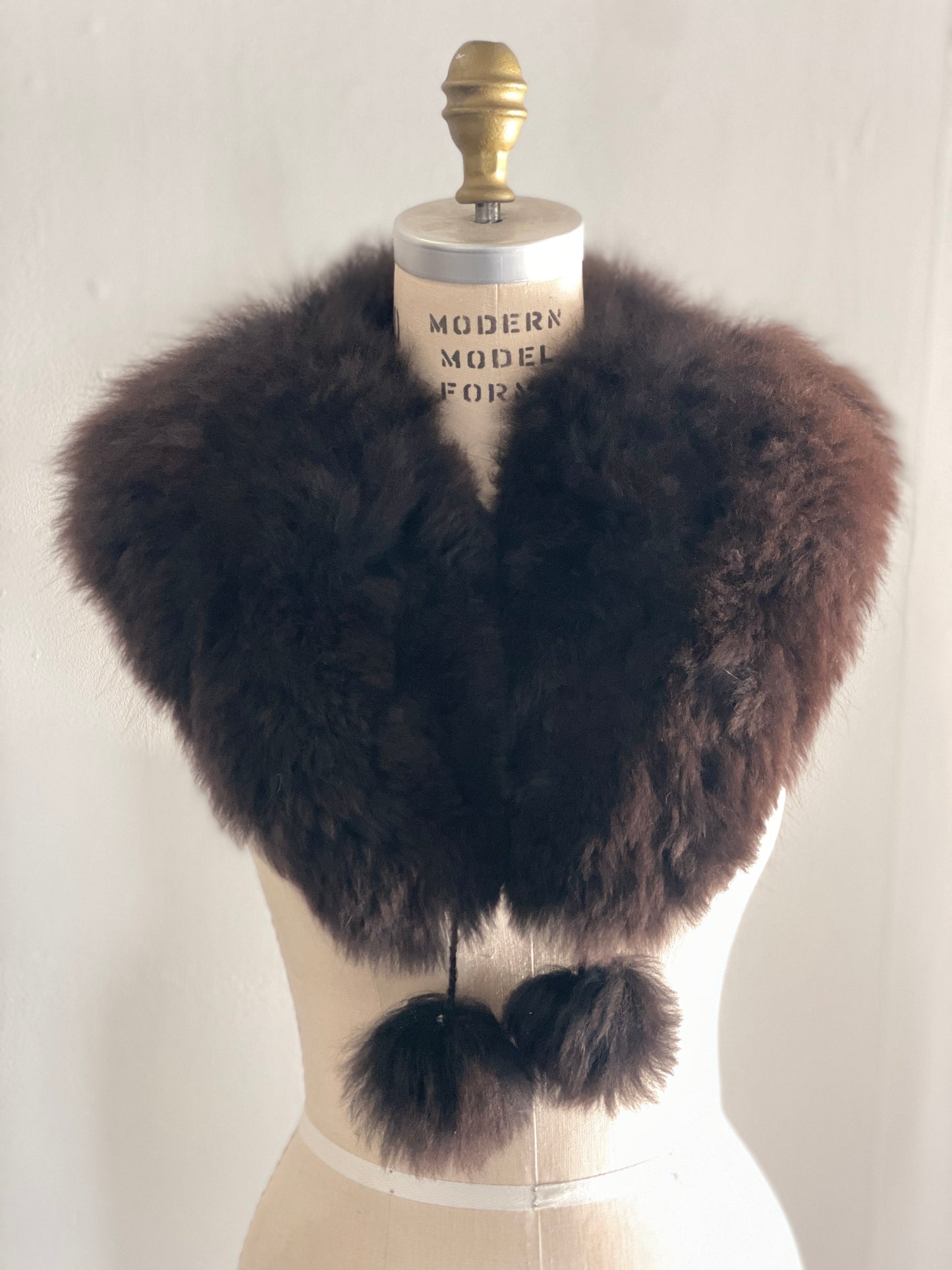 alpaca stole with pom poms