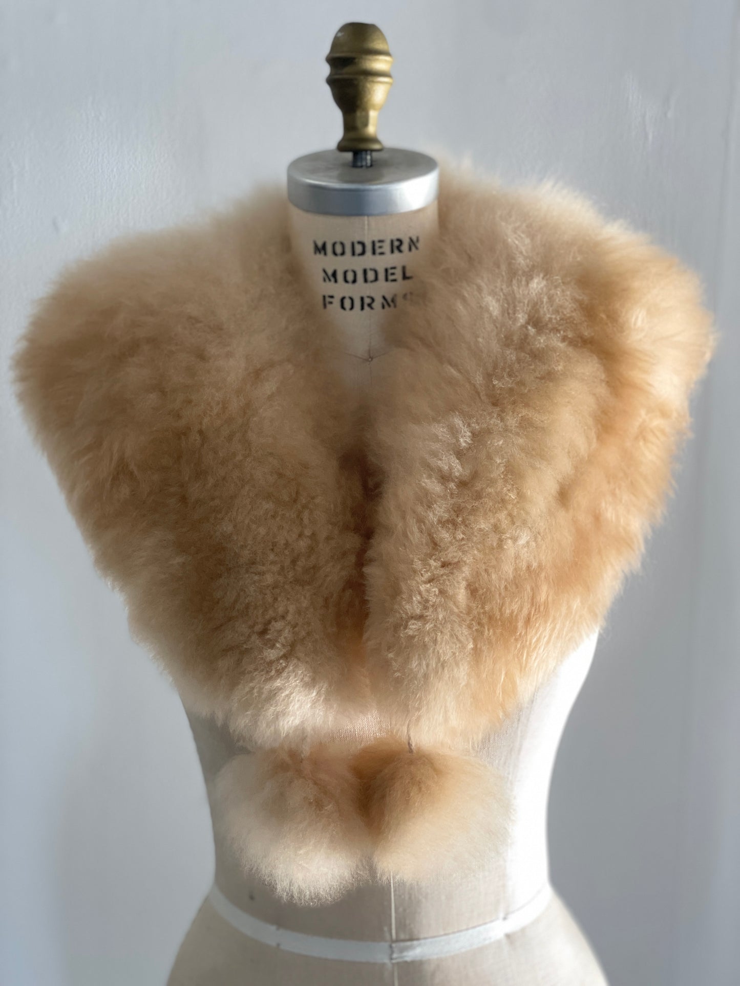 alpaca stole with pom poms