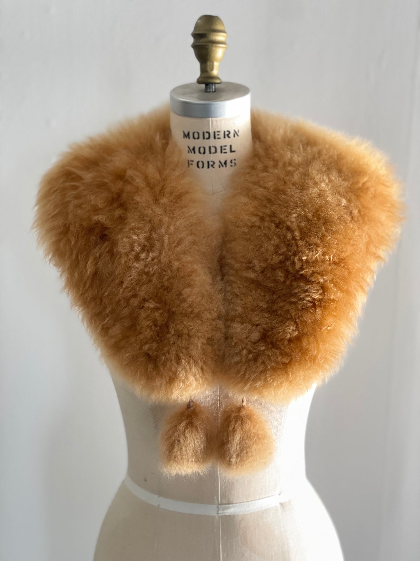 alpaca stole with pom poms