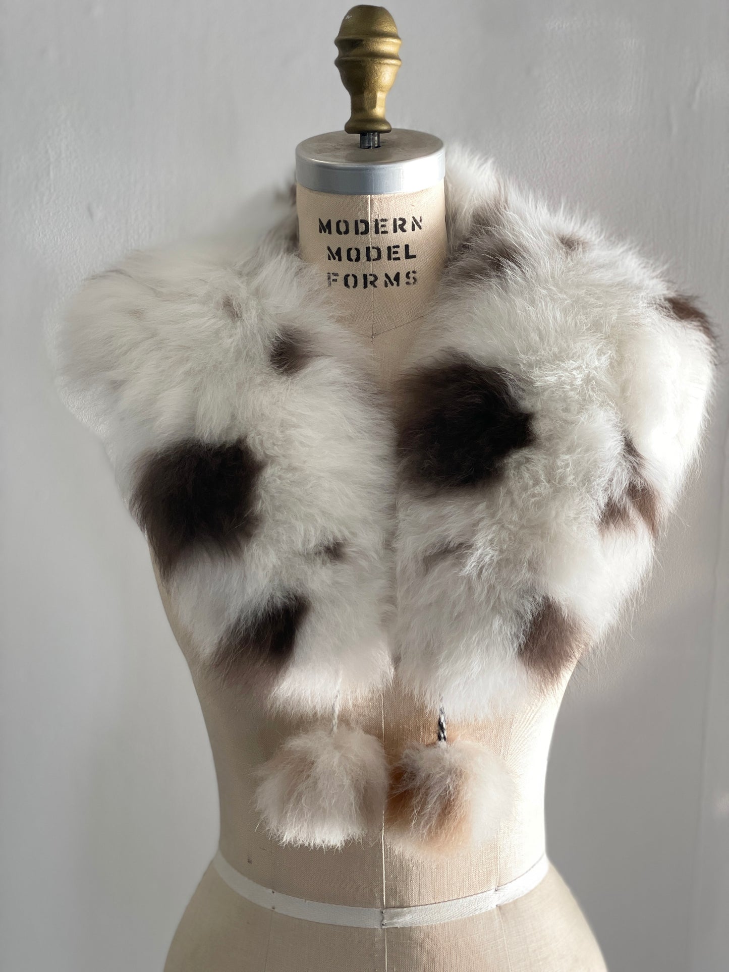 alpaca stole with pom poms